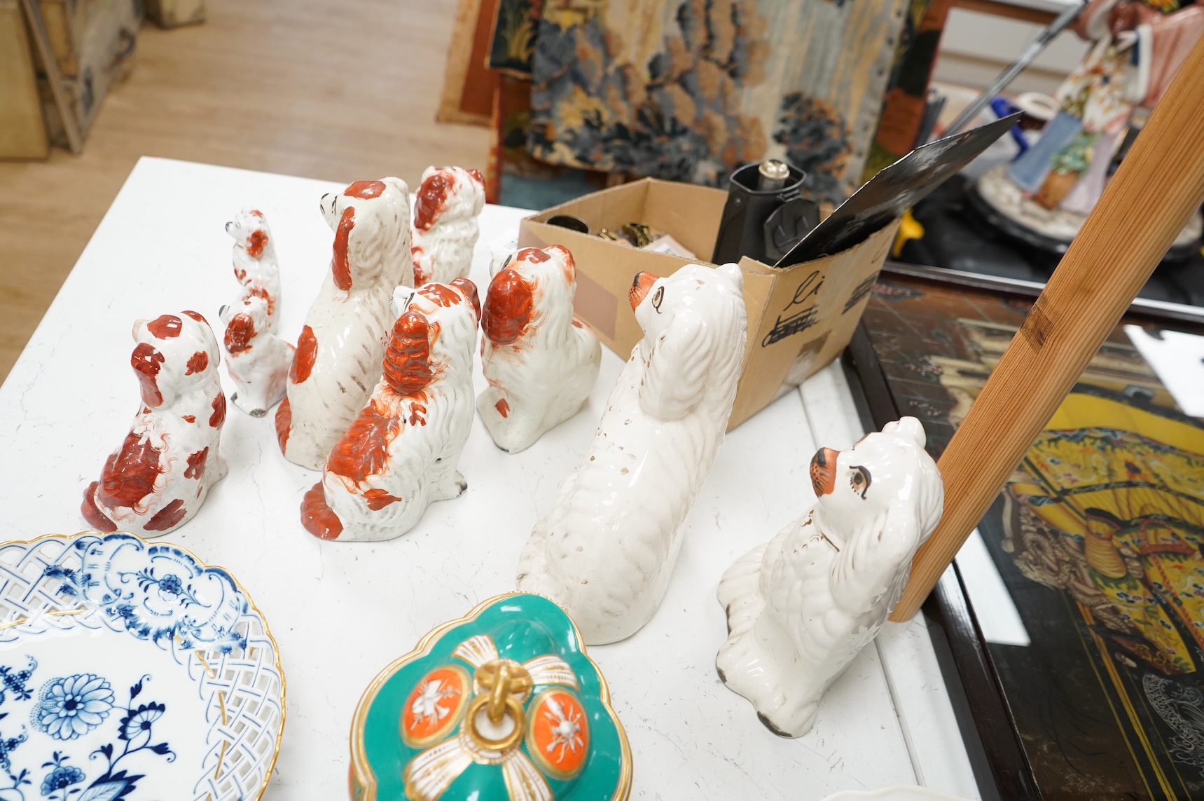 Nine different sized 19th century Staffordshire chimney dogs, tallest 23cm
